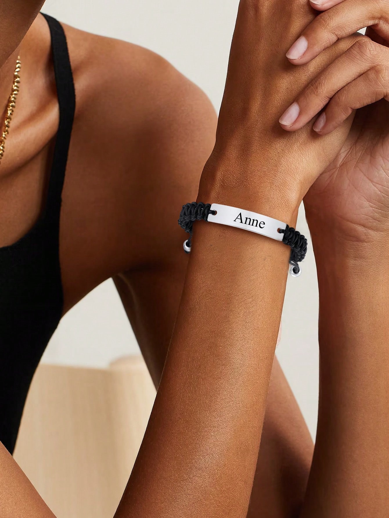 Adjustable stainless steel curved ID bracelet, customizable with name